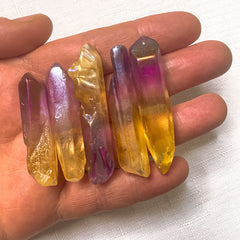 https://www.thesanctuarybne.com/products/purple-yellow-aura-quartz-pieces-med