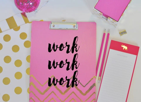 notebook that says work