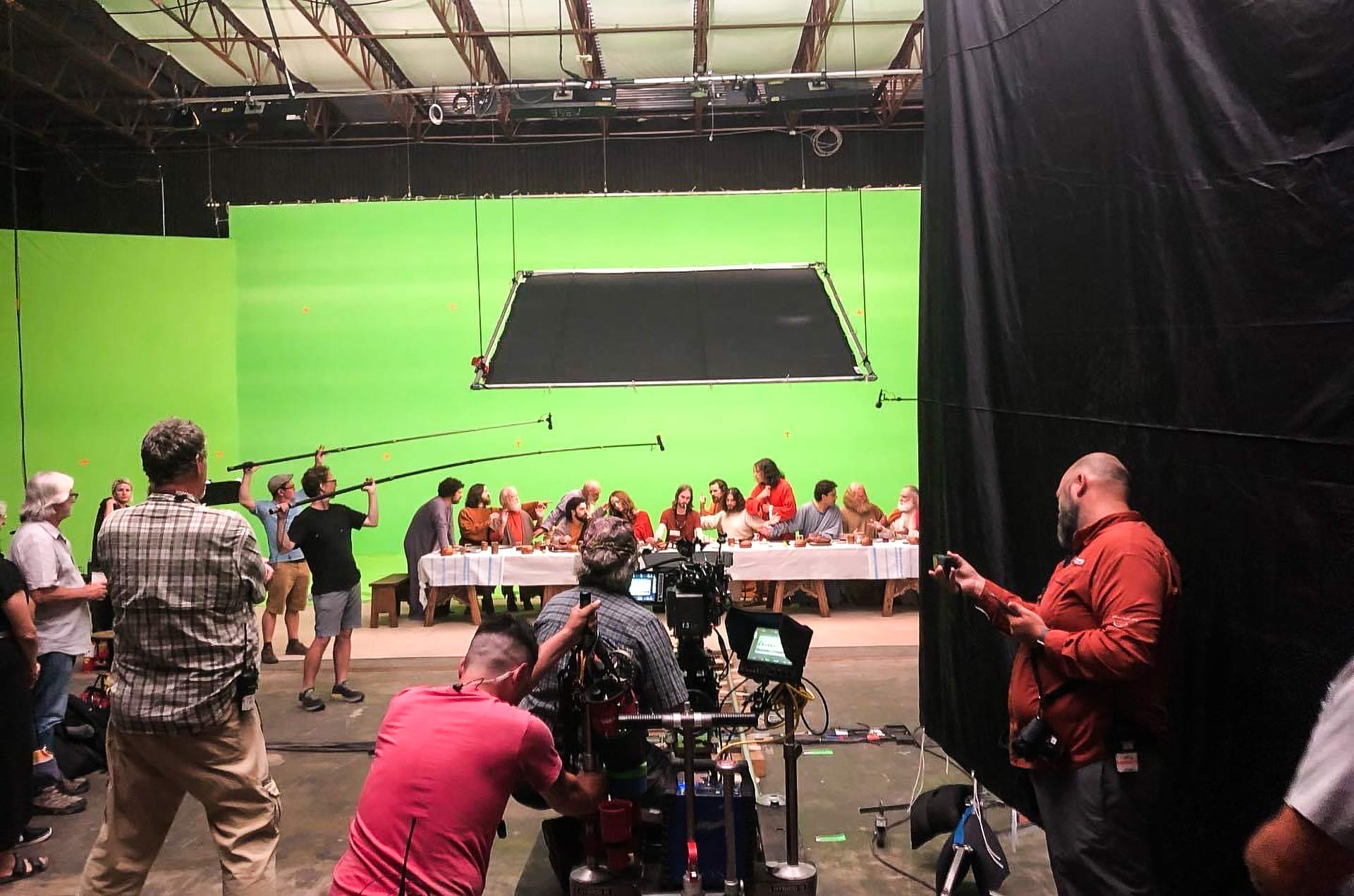 Jesus at the last supper. Left to right Boom operators Matthew Armstrong, Ryan Farris and a C-Stand