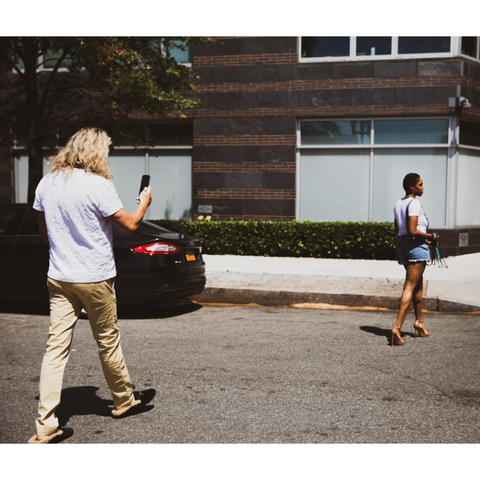 couple walking across street