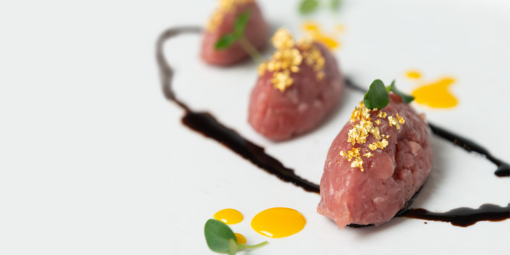 Edible gold crumbs of 23k gold - TitaItalia
