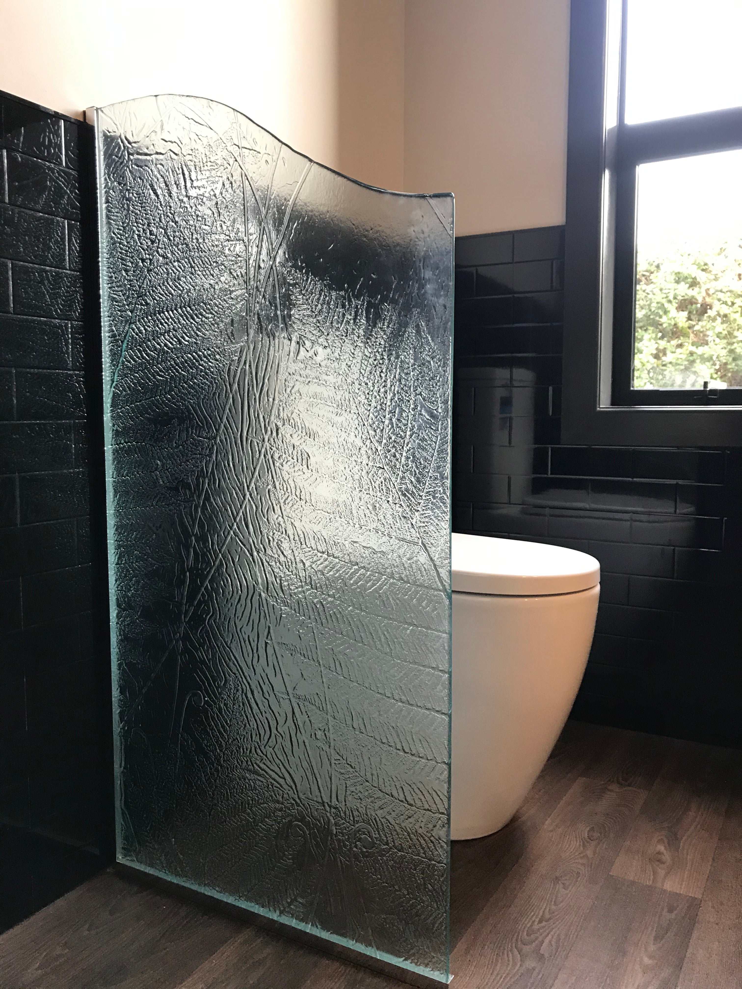 Broad reeded textured patterned fluted or slumped glass shower panels for the bathroom