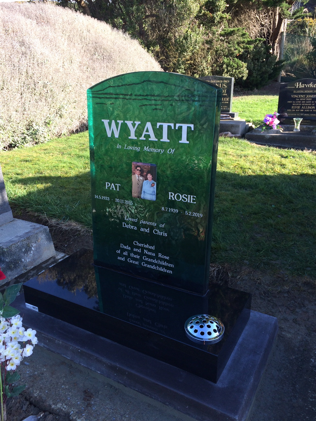 Slumped green glass headstone with memorial ceramic plaque made in new zealand by escape glass