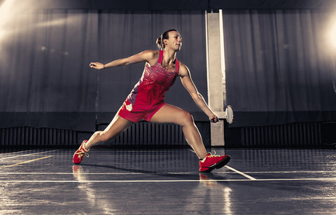 Young Female Player on Badminton Court