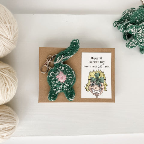 Green lucky cat butt keychain with Happy St. Patrick's Day funny card