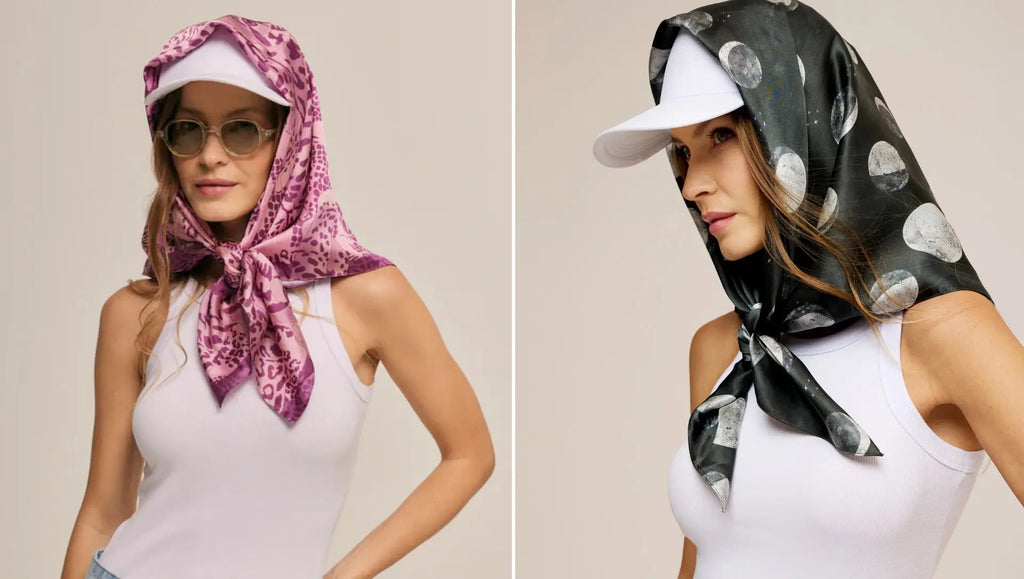Two styles of scarves worn with a cap: a pink scarf with animal print and a satin black scarf with a moon phases print, both adding charm to a casual look.