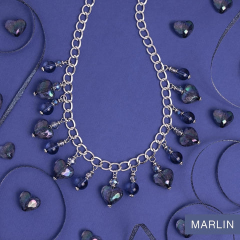 Spring 2024 Pantone Color Marlin. Sleek and sophisticated, Marlin exudes timeless charm. This versatile shade effortlessly transitions from day to night, making it a wardrobe essential.