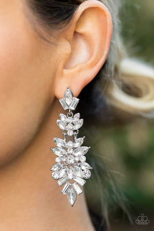 Frozen Fairytale - White Item #P5PO-WTXX-349XX Trestles of round, marquise, and emerald cut rhinestones cluster into three sparkly segments as they link into a jaw-dropping lure, resulting in an icy statement piece. Earring attaches to a standard post fitting.  Sold as one pair of post earrings.