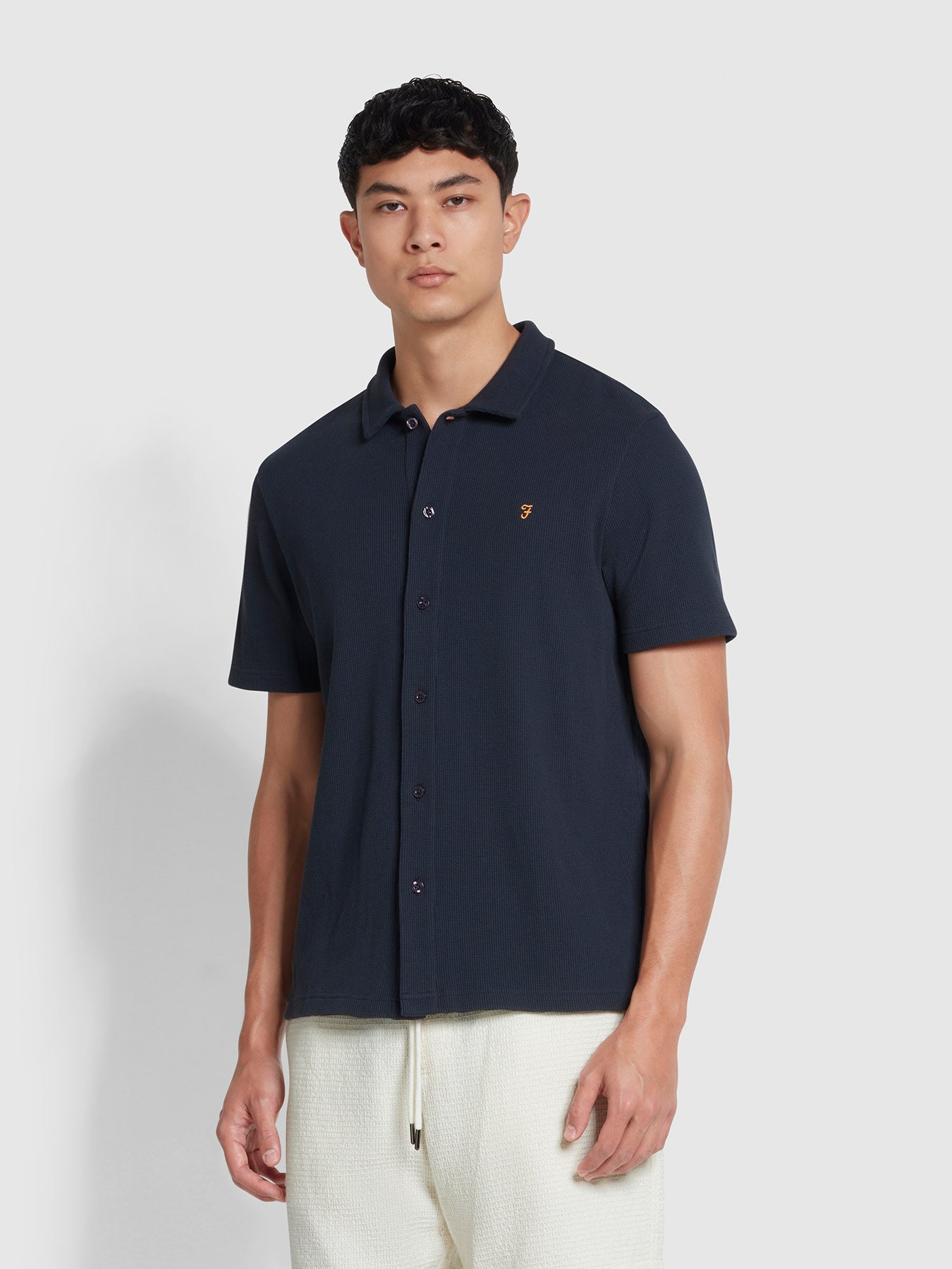 View Denny ButtonThrough Waffle Polo Shirt In True Navy information