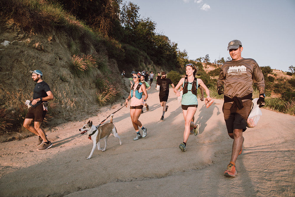 running and picking up trash