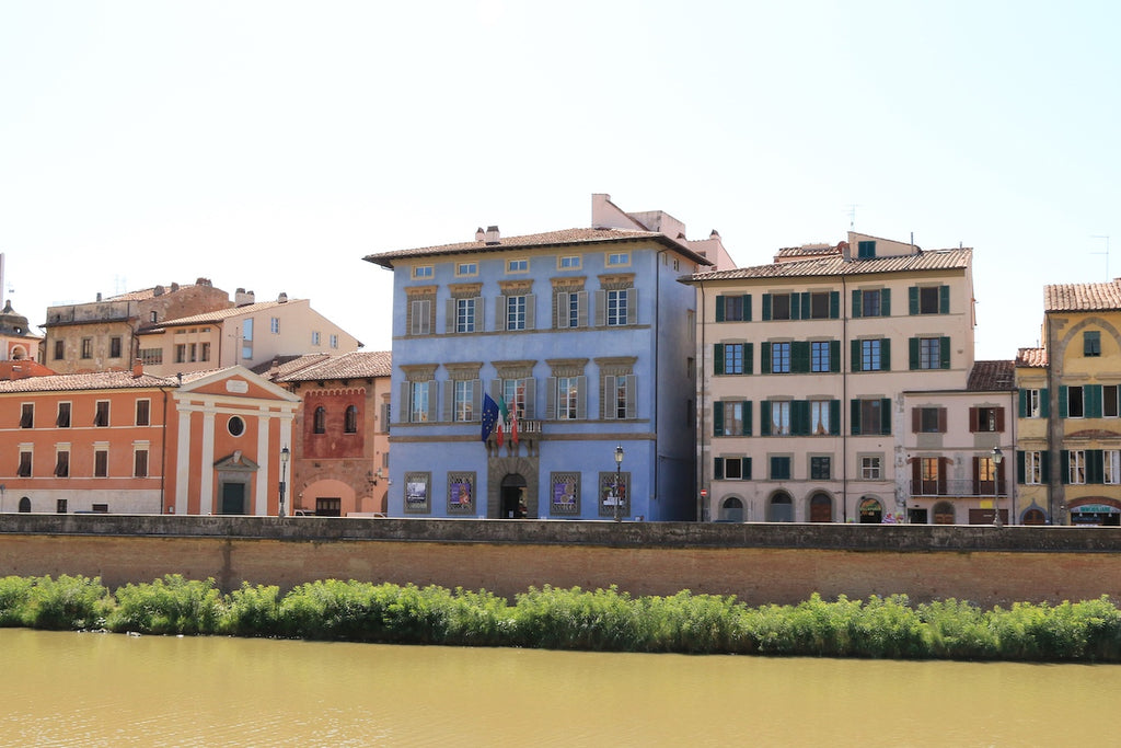 Palazzo Blu facade on river