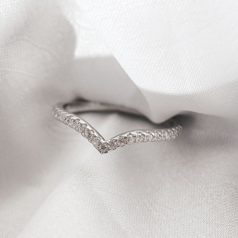 Chevron diamond eternity band in white gold to match your diamond engagement ring.