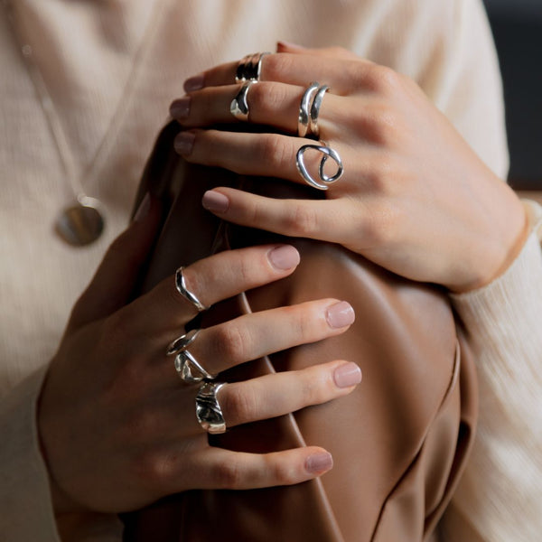 Sterling silver rings in bold organic forms.