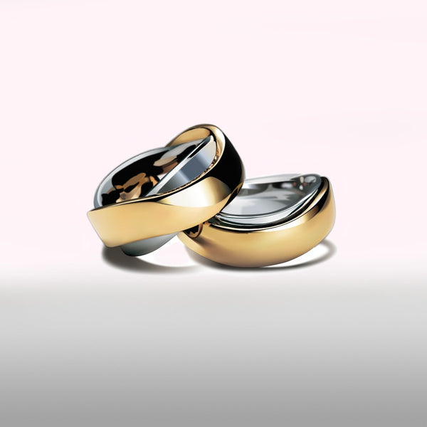 Two-tone, Chunky, Sculptural Wedding Bands in White and Yellow Gold.