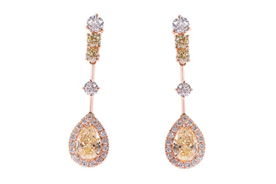Aretes marca Crivelli con diamantes en oro rosa de 18k