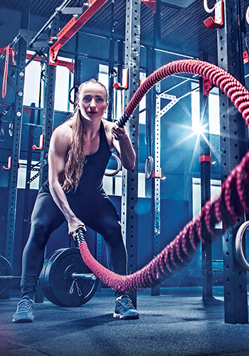 Woman at the gym exercising