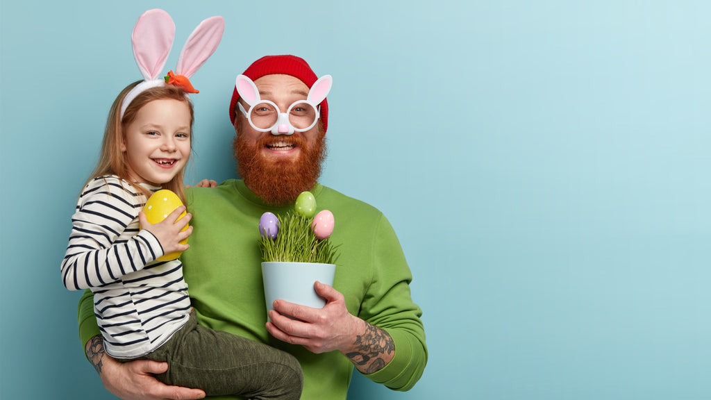 Dad holding his daughter in Easter pictures