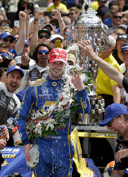 Andretti Autosport's Alexander Rossi (98) celebrates after winning the 100th running of the Indianapolis 500 Sunday, May 29, 2016, afternoon at the Indianapolis Motor Speedway. --Matt Kryger/IndyStar