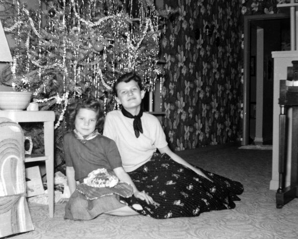 Myrna and Judy Dahl celebrating Christmas at the family home at 2703 Woods Drive, 1953. -- MYRNA DAHL MARTINSON