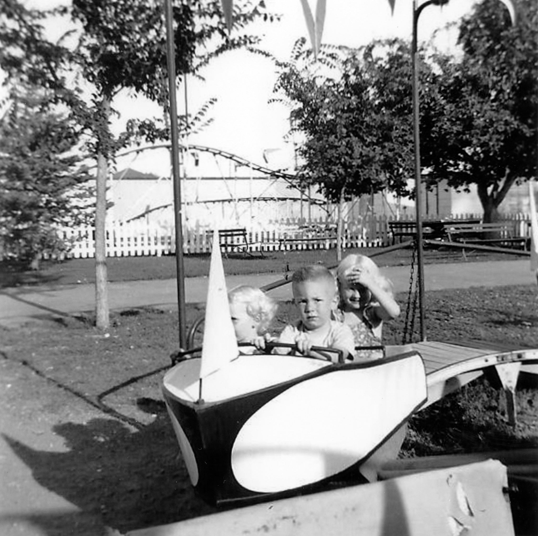 Arlene, Gary, and Joan Drake at the Wonderland amusement park, circa 1956. -- Arlene Drake Hegel