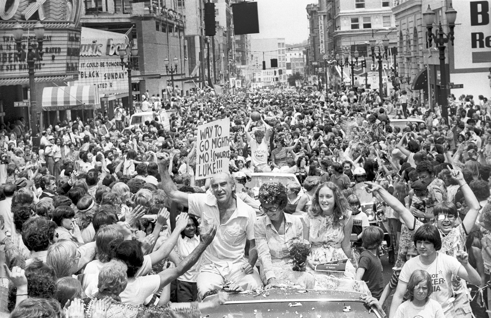 In one of the most memorable images from the 1976-77 championship season, Blazers coach Jack Ramsay and his family are surrounded by Blazers fans as the team makes its way down Southwest Broadway for the victory parade. -- THE OREGONIAN/OREGONLIVE