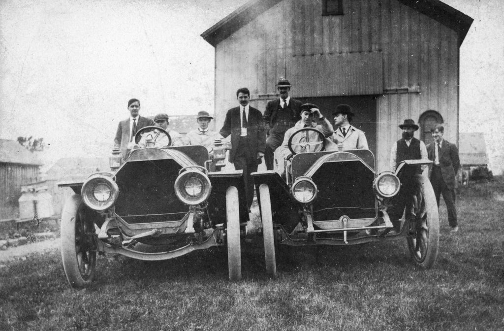 E. R. Thomas Company employees with Thomas Flyer cars, 1908. The test driver on the right is Clarence Buxton. Clarence was scheduled to drive in the 1908 New York to Paris race, but decided to stay home since his wife was expecting their first child.