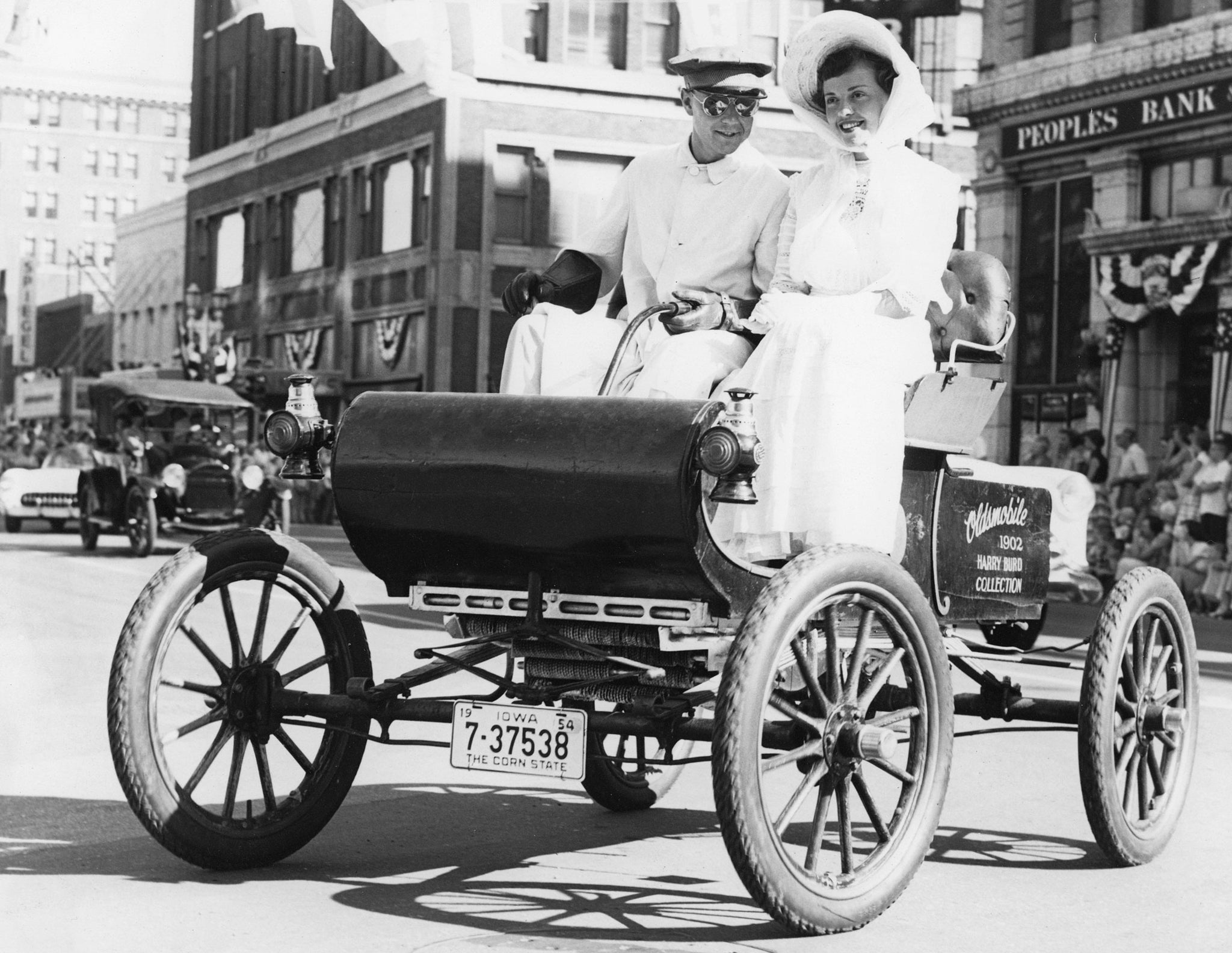 Harry Burd in his 1902 Oldsmobile for the Waterloo Centennial celebrations in 1954. -- Courtesy Grout Museum Archives