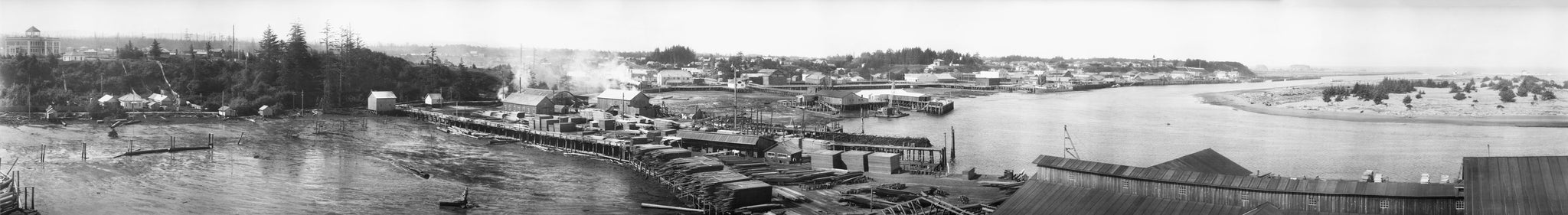 F. W. Sheelor, a pioneer of panoramic photography, took this photograph of Bandon’s harbor and mills from the water tower of Moore Mill. -- Courtesy Bandon Historical Society Museum