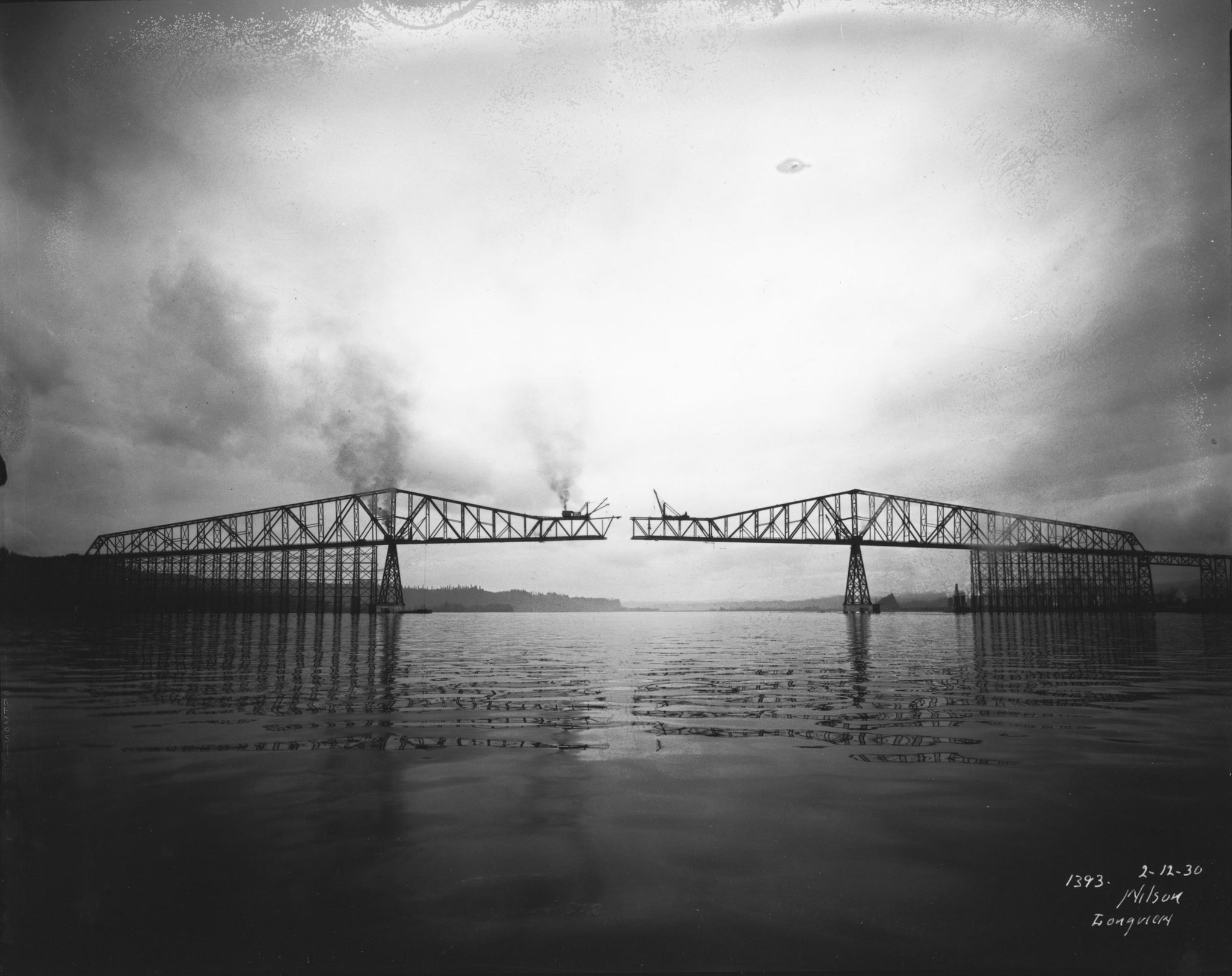 The Longview Bridge nearing completion in 1930. -- Longview Public Library