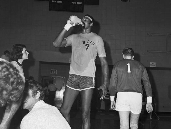 NBA legend “Big Dipper” Wilt Chamberlain standing head, shoulders, and torso over the competition at a volleyball match versus the Meadville YMCA team at David Mead Field House, May 27, 1972. -- COURTESY MEADVILLE TRIBUNE