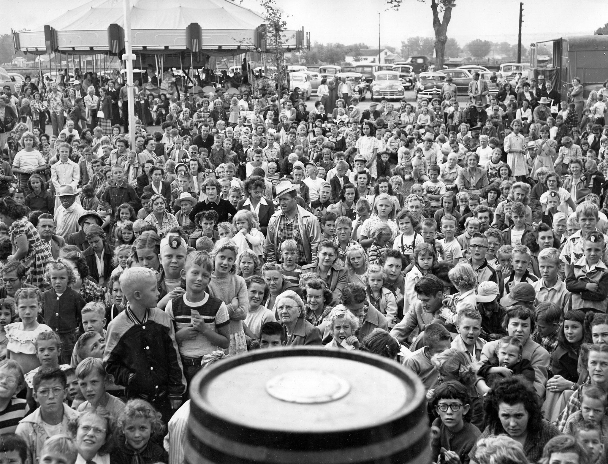 The crowd for Bozo Day at Wonderland amusement park, 1954. Bozo "the Capitol Clown," known at the time for his best-selling children's records on Capitol Records, was featured at Wonderland for special events. -- Foote Collection, Western Heritage Center