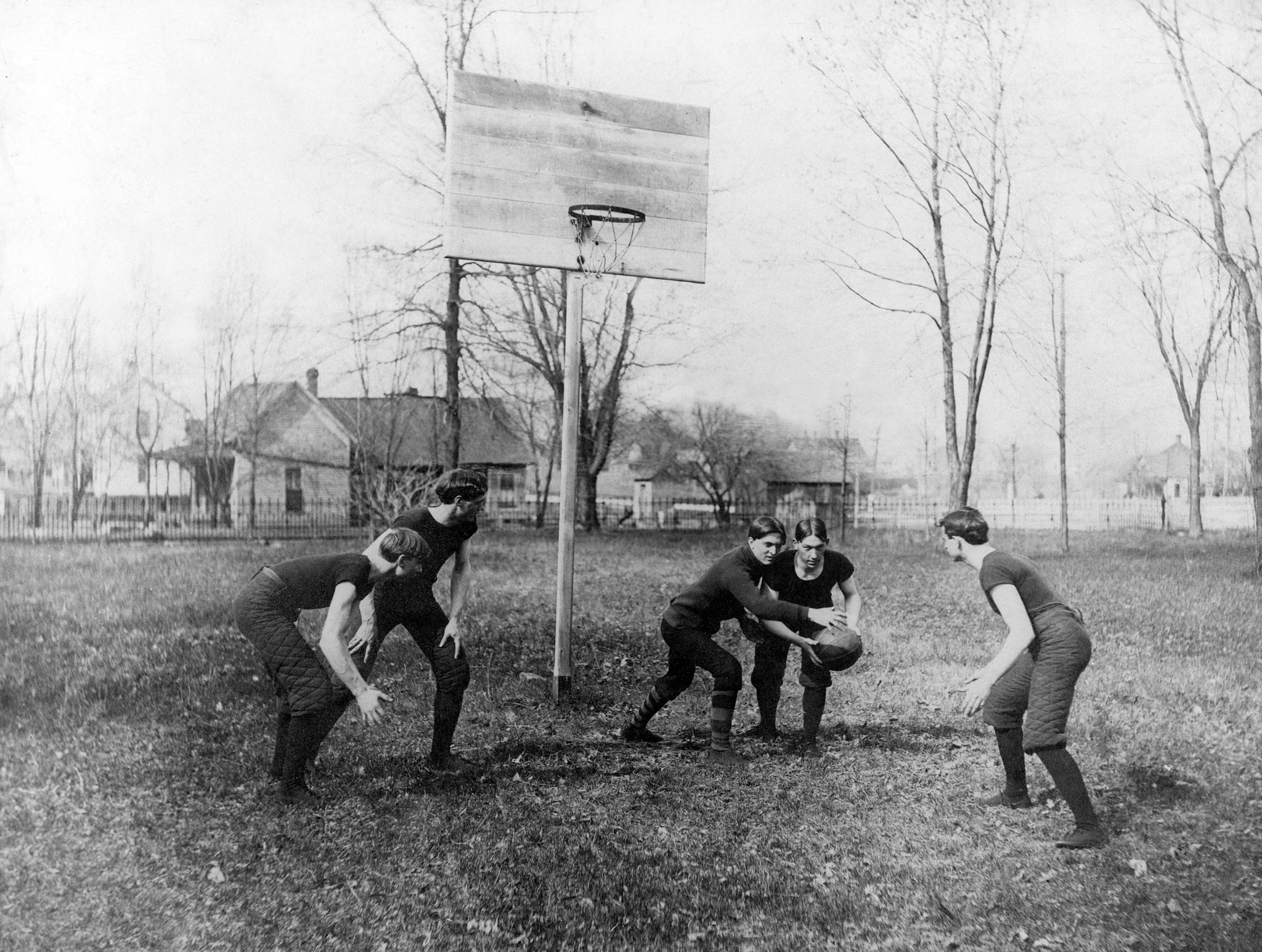 Boys practicing basketball on the Southern Illinois Normal University campus, circa 1904. -- Southern Illinois University Archives, Southern Illinois University Carbondale Collection, Box 1-Folder 10