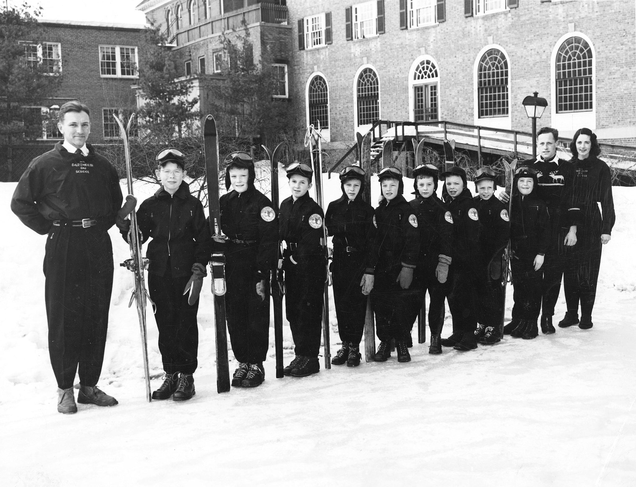 Ford Sayre Ski Team on the skating rink beside Hanover Inn, 1949. From left: Jerry Hickson, Philip Jensen, Bill Aldrich, Jerry Burt, Rick Barrett, Robert Fuller, Lawrence Gazley, Bill Orcutt, Peter Sadler, Peter Coyle, Al Peavey, Elizabeth “Lib” Fitzgerald. -- Courtesy Norwich Historical Society