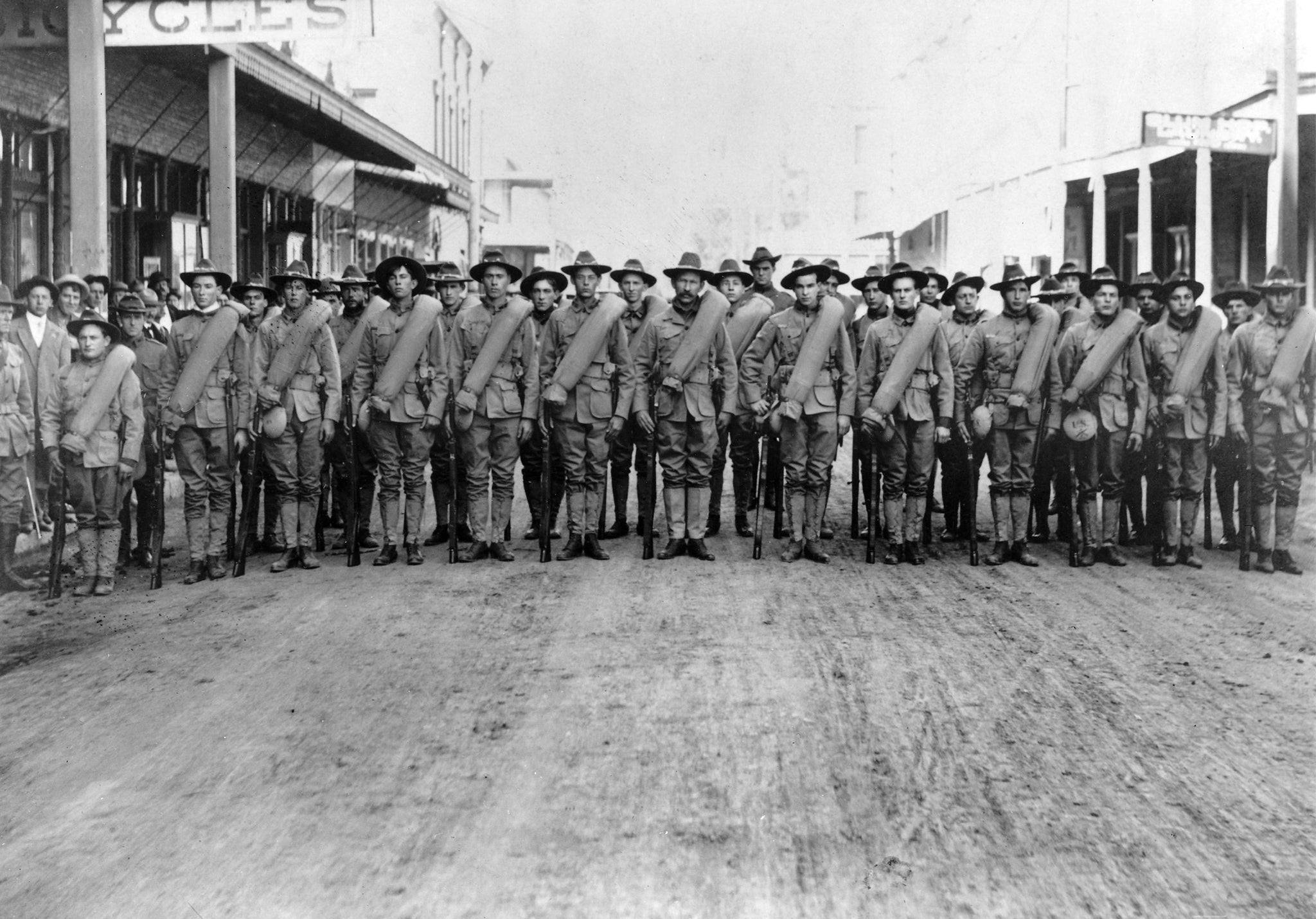 Company F. Second Infantry lined up on Main Street prior to leaving for induction into federal service for the Spanish-American War, Woodland, 1894. -- Courtesy of Yolo County Archives