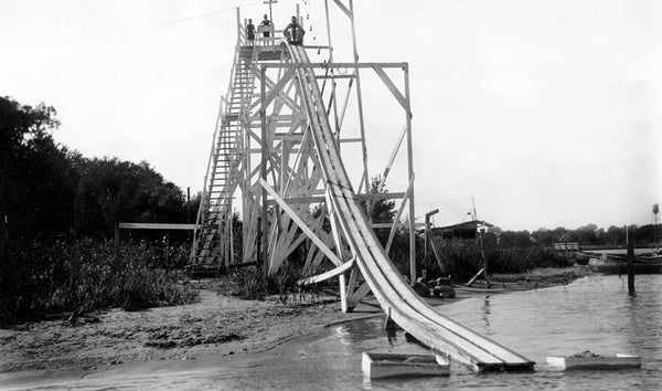 People enjoying a slide at Madison Lake, circa 1920. -- Courtesy Blue Earth County Historical Society