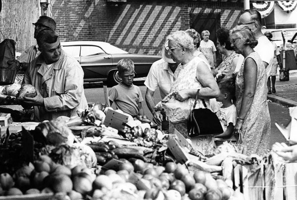 Shoppers peruse the offerings at the Derby Square market, circa 1971. -- Courtesy Phillips Library, Peabody Essex Museum
