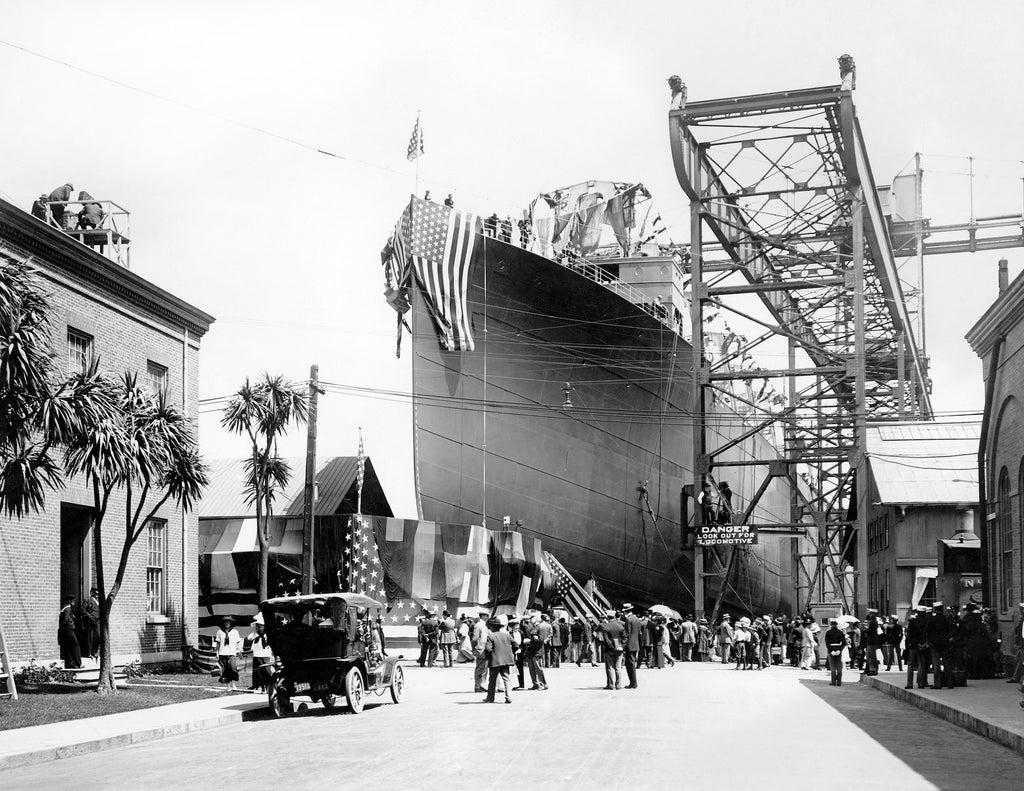 Launching ceremony for the collier USS Prometheus at Mare Island Navy Yard in 1908. At the time of its launch, it was the largest, most expensive ever built at Mare Island. The launching ceremony was followed by a luncheon for 3,000 people. Unfortunately, many of the celebrants were stricken with food poisoning following the banquet. -- Courtesy Vallejo Naval and Historical Museum