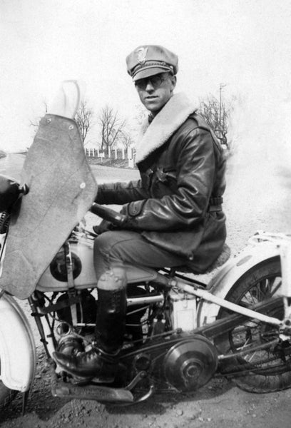 Jack Dickey on his California Highway Patrol motorcycle, Woodland, 1931. Jack was one of the early California Highway Patrol officers. -- Courtesy of Helen Mitchell