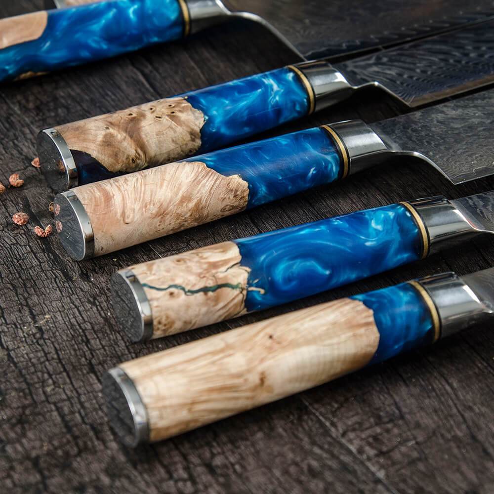 https://cdn.shopify.com/s/files/1/0021/3997/9865/products/damascus-kitchen-knife-set-9-piece-japanese-knife-set-524634_1024x1024@2x.jpg?v=1681182287