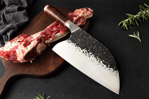 What is the best knife to use to cut raw meat?
