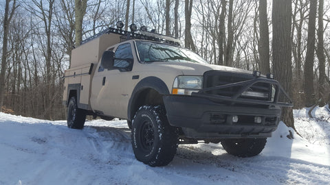 F250 Off-grid camper snow Durabak Coated