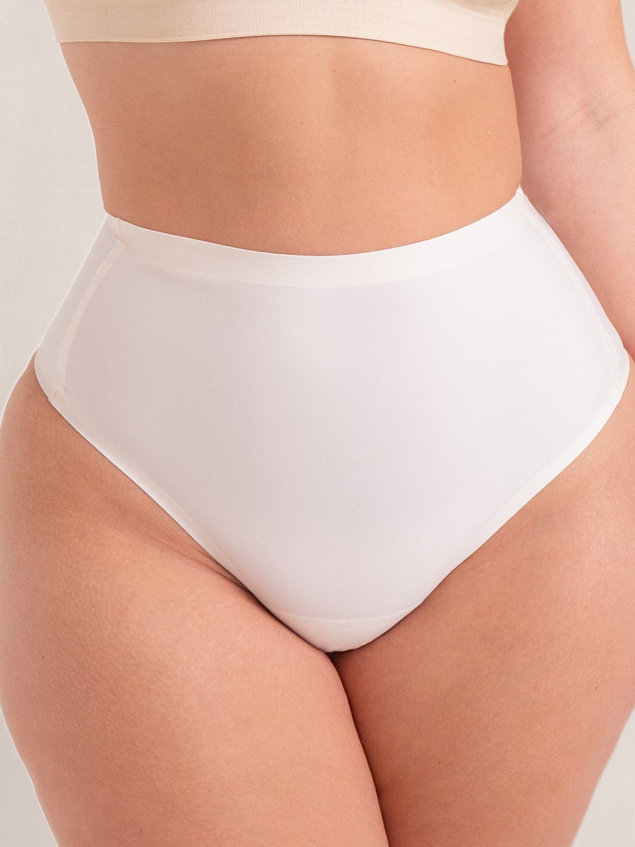 Truekind Seamless Stretch Mid-Waist Thong beige