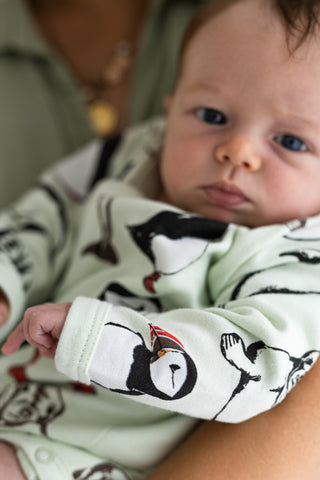 Fauna kids puffin print baby bodysuit photographed by Ausra Dooley