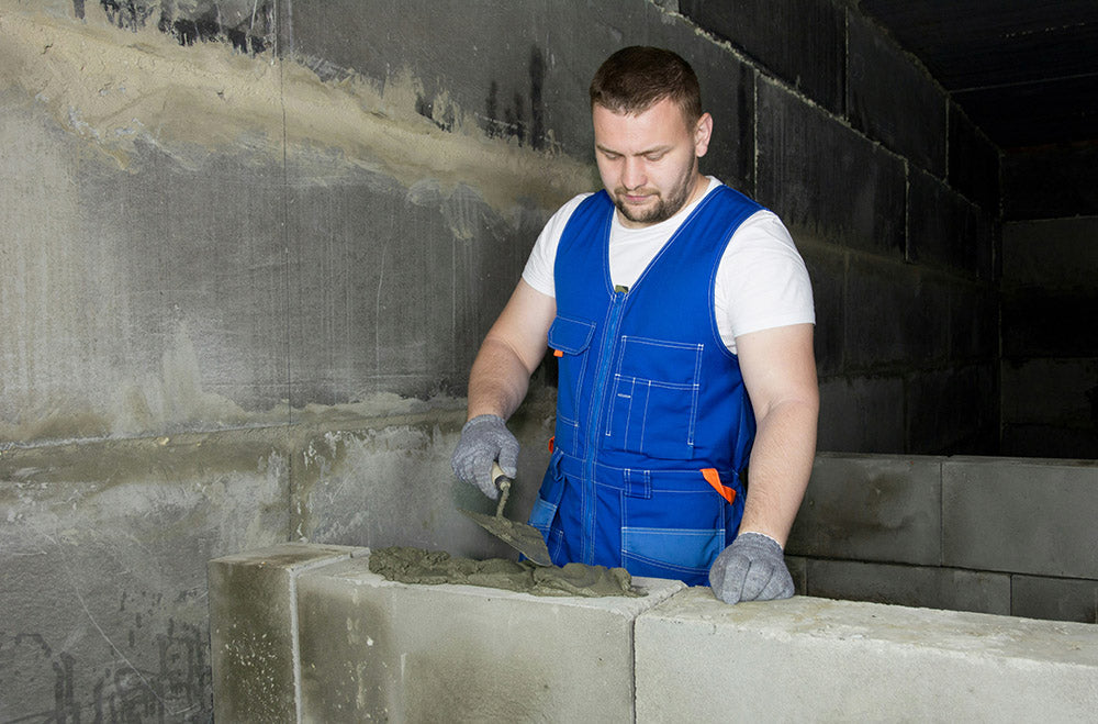 Bearded man working on a building site