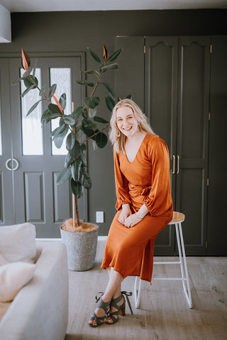 Sit on a stool for Lifestyle Poses For Your Brand Shoot