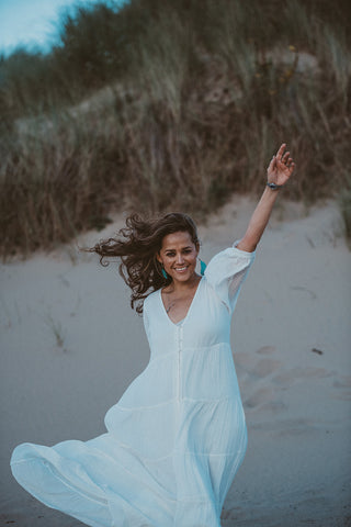 At the beach is a great place for Lifestyle Poses For Your Brand Shoot