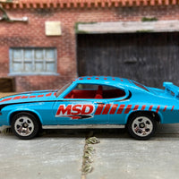 Loose Hot Wheels 1970 Pontiac GTO Judge Dressed in MSD Light Blue and Red Livery