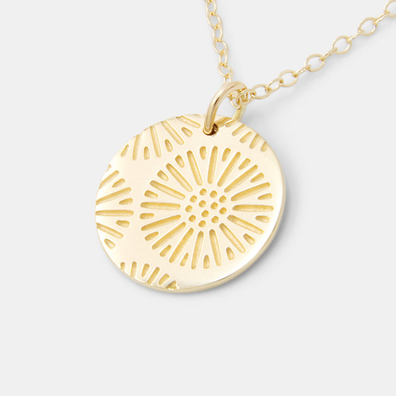 Gold jewellery in Australia, including this solid gold coral texture pendant necklace.