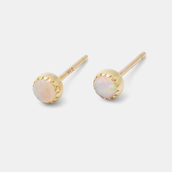 Birthstones by month jewellery: opal earrings in gold