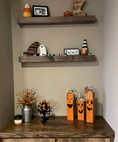 Halloween decor on floating shelves